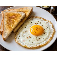 Golden Yolk Delight/Egg half fry in pure ghee with 3 pcs toasted bread